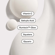 Close-up of serum texture, key ingredients labelled: Vitamin C, Salicylic Acid, Illumiscin™-Glow, Squalane, Glycerin.