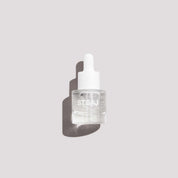 ST.SAJ Hyaluronic Smoothing Complex Mini 15ml clear dropper bottle on grey background.