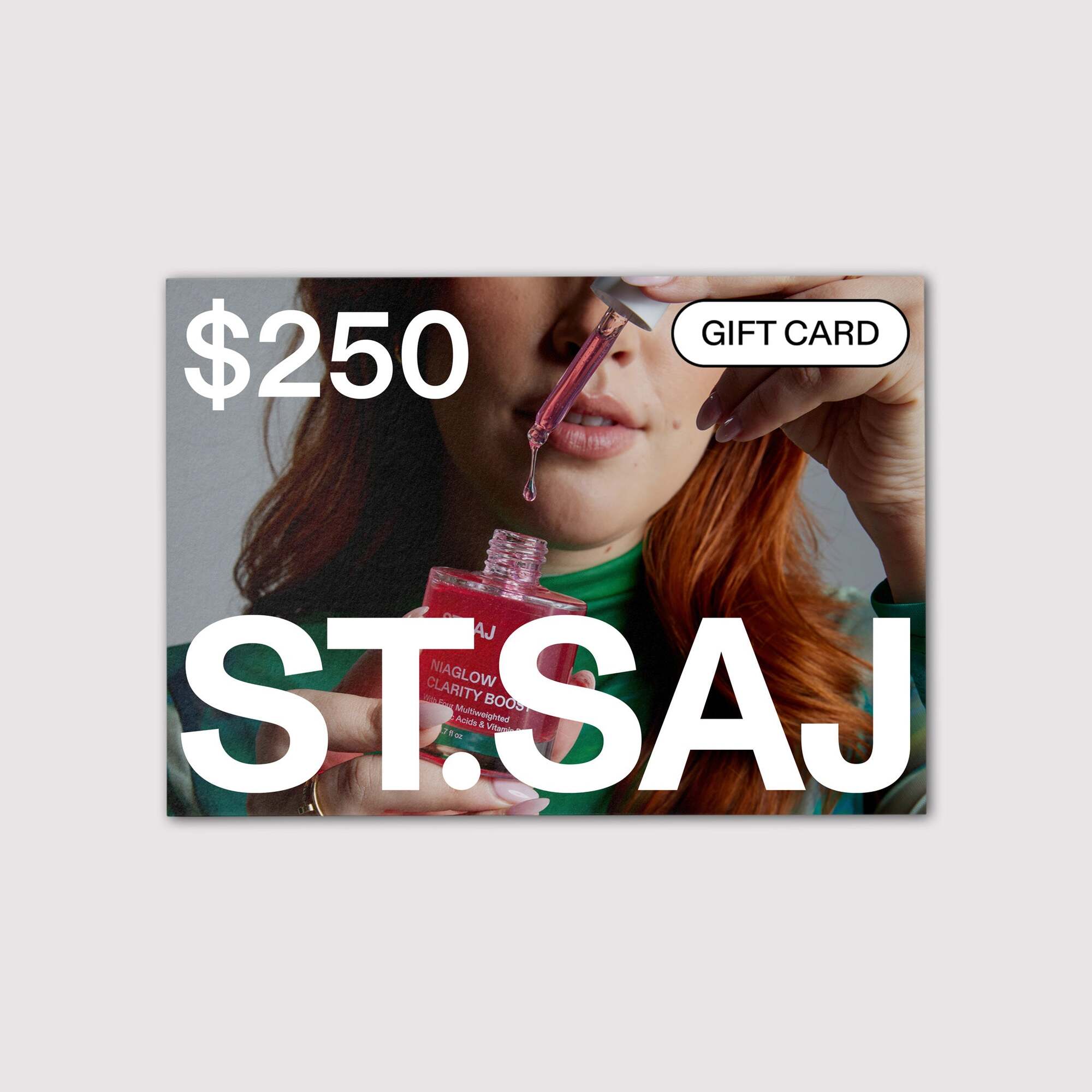 ST.SAJ $250 gift card with woman in green top.