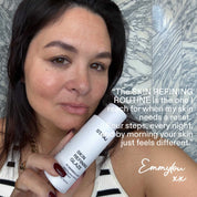 Founder Emmylou holding ST.SAJ Skin Refining Glaze bottle, quote: the Skin Refining Routine is the one I reach for when my skin needs a reset, four steps every night, by morning your skin just feels different. Emmylou xx.