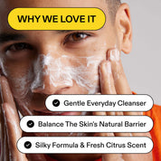 Person applying white foam cleanser to face, text: why we love it, gentle everyday cleanser, balance the skin's natural barrier, silky formula & fresh citrus scent.