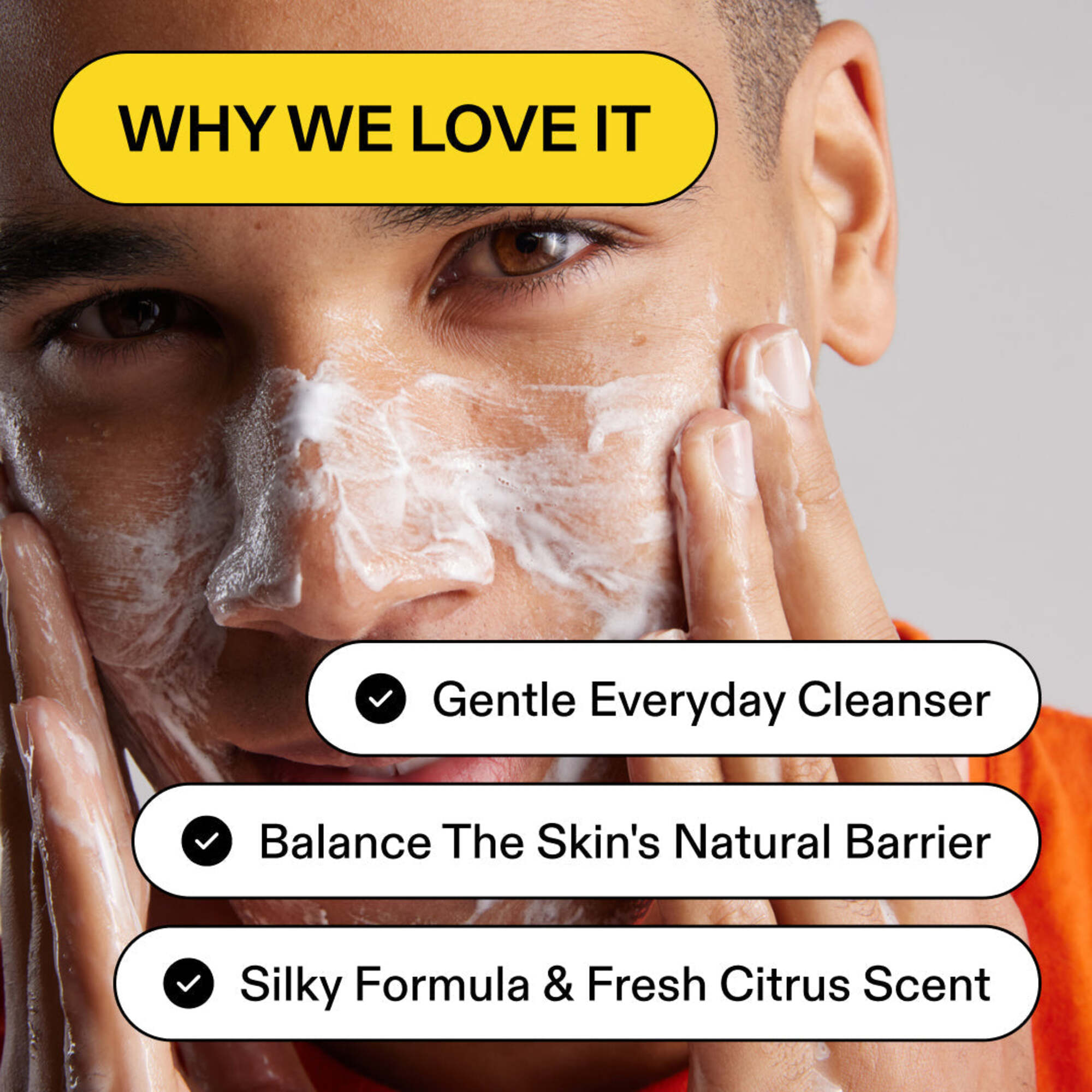 Person applying white foam cleanser to face, text: why we love it, gentle everyday cleanser, balance the skin's natural barrier, silky formula & fresh citrus scent.