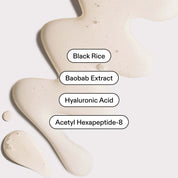 Close-up of cream texture, key ingredients labelled: Black Rice, Baobab Extract, Hyaluronic Acid, Acetyl Hexapeptide-8.