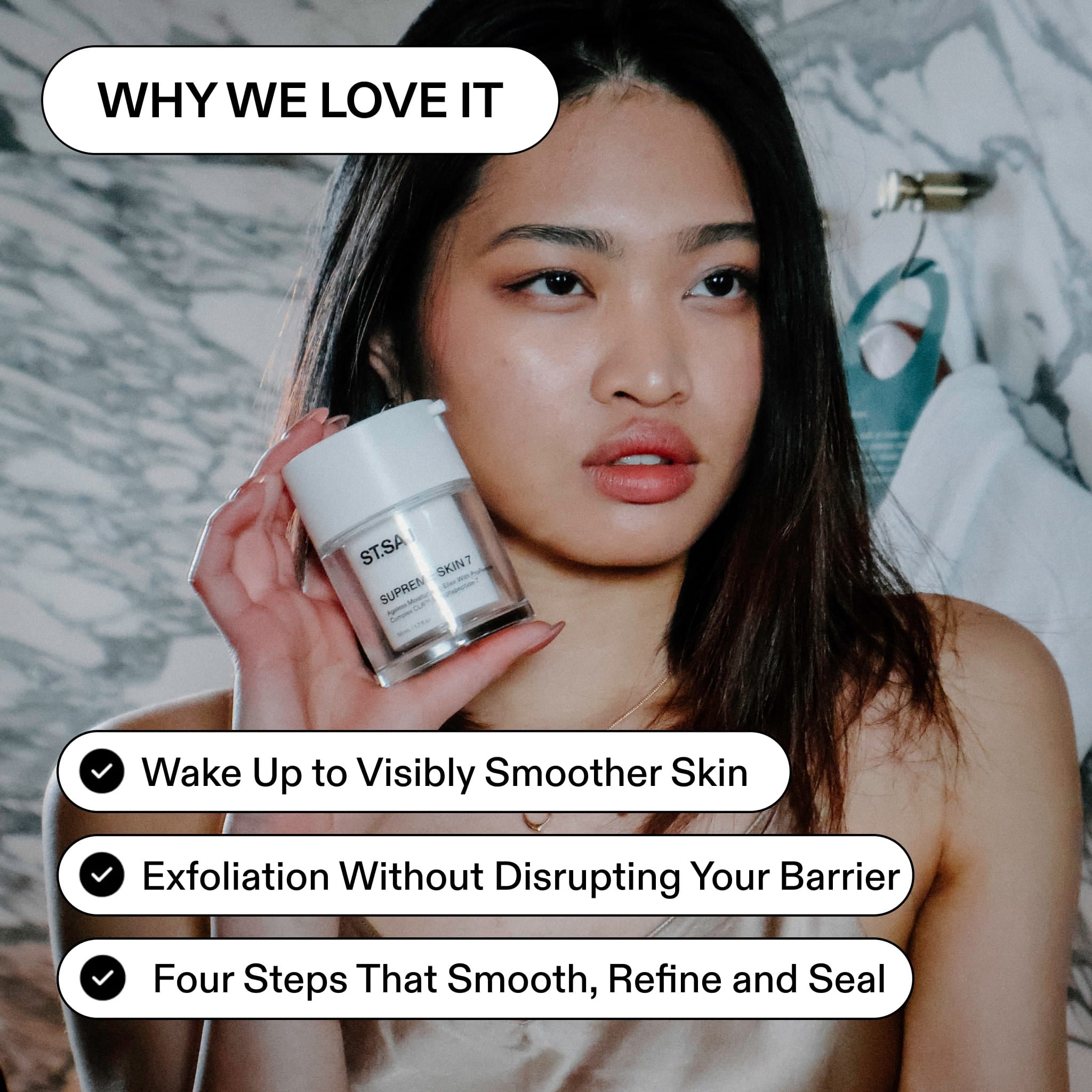ST.SAJ Skin Refining Routine: model holding Supreme Skin 7 moisturiser, why we love it