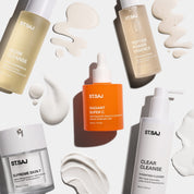 ST.SAJ Glow Kit products flat lay - Glow Cleanse, Clear Cleanse, Radiant Super C, Peptide Power Essence and Supreme Skin 7