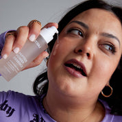 ST.SAJ Peptide Power Essence - model holding essence, hydrating toning prep step for skin