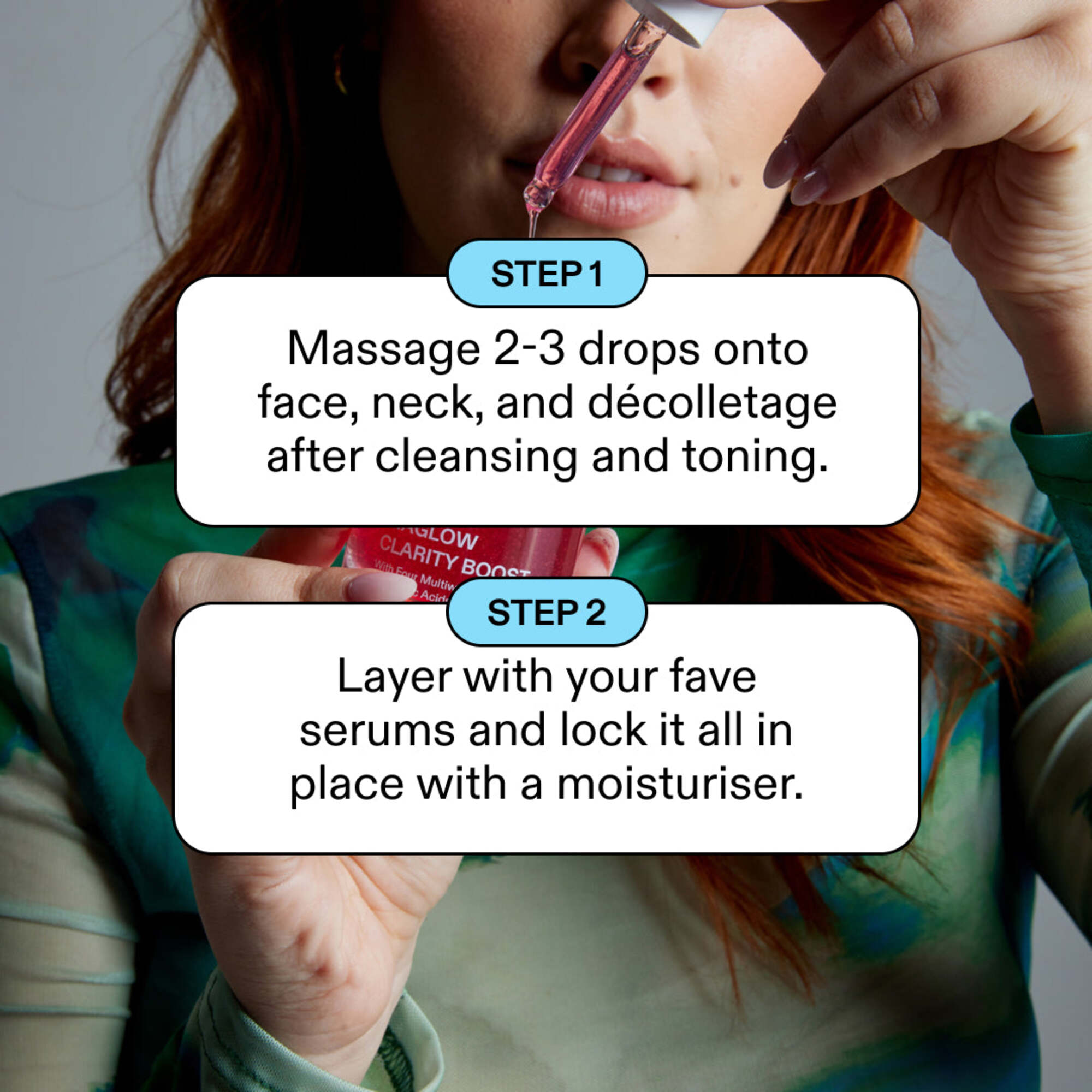 Red-haired woman applying product, two-step guide: massage 2-3 drops onto face neck and décolletage after cleansing and toning, layer with serums and lock in place with a moisturiser.