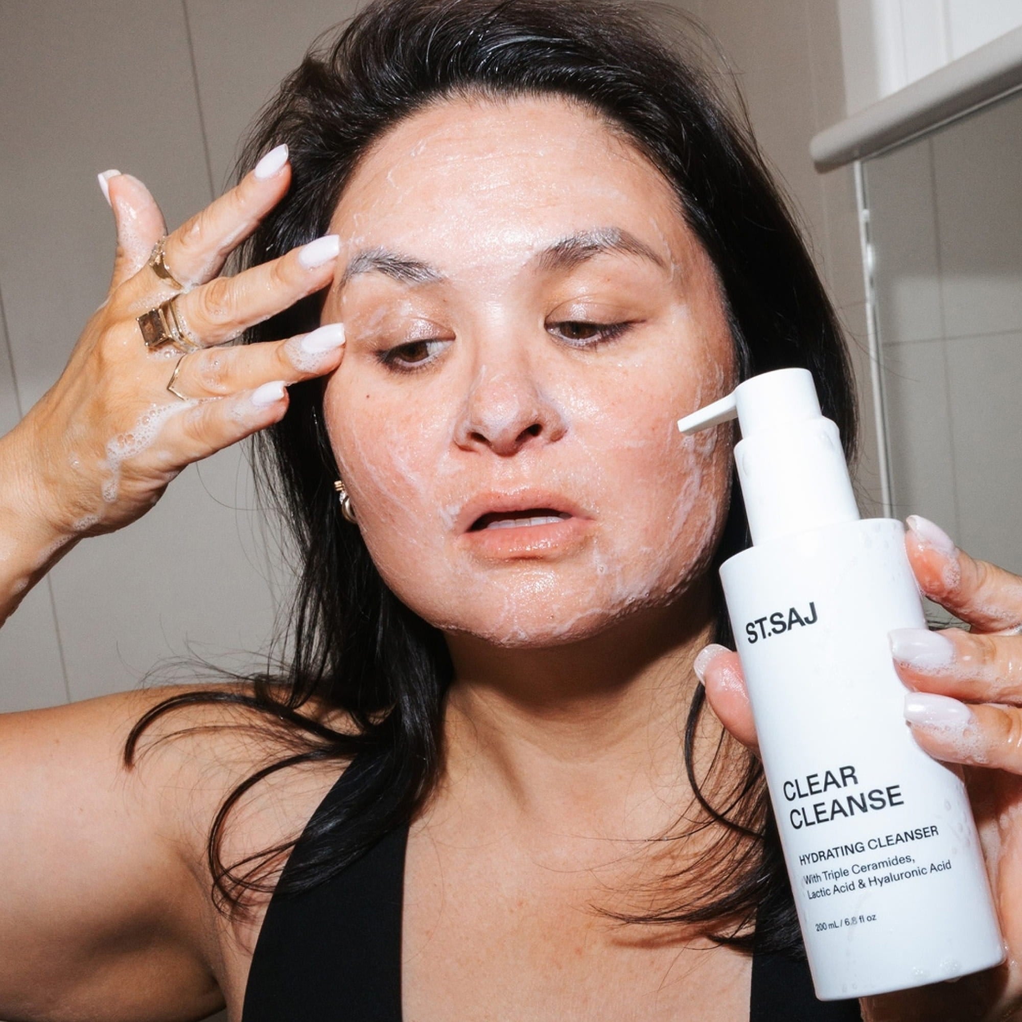 Woman applying ST.SAJ Clear Cleanse ceramide face wash - Australian barrier-safe cleanser