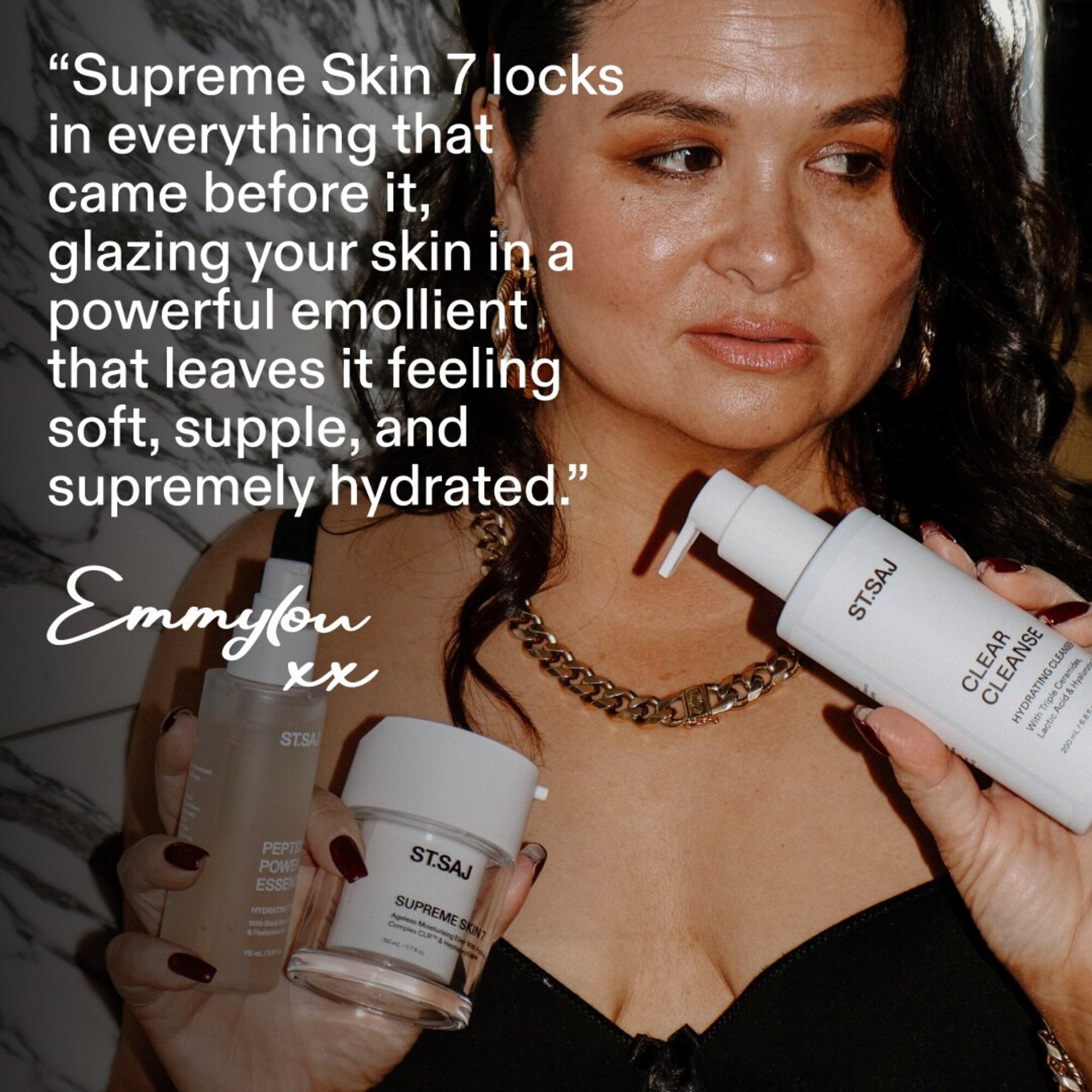 Founder Emmylou holding ST.SAJ products, quote: Supreme Skin 7 locks in everything that came before it, glazing your skin in a powerful emollient.