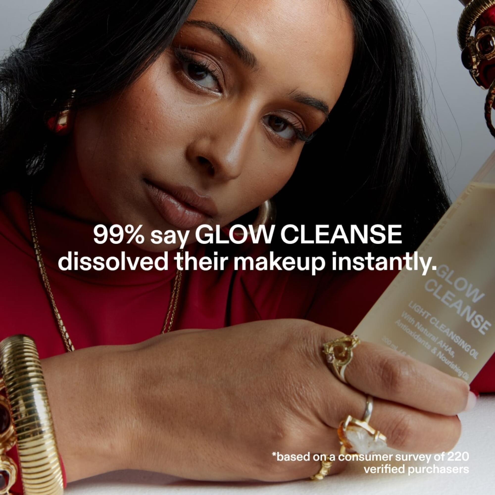 ST.SAJ Glow Cleanse - model applying cleansing oil, 99% say Glow Cleanse dissolved their makeup instantly