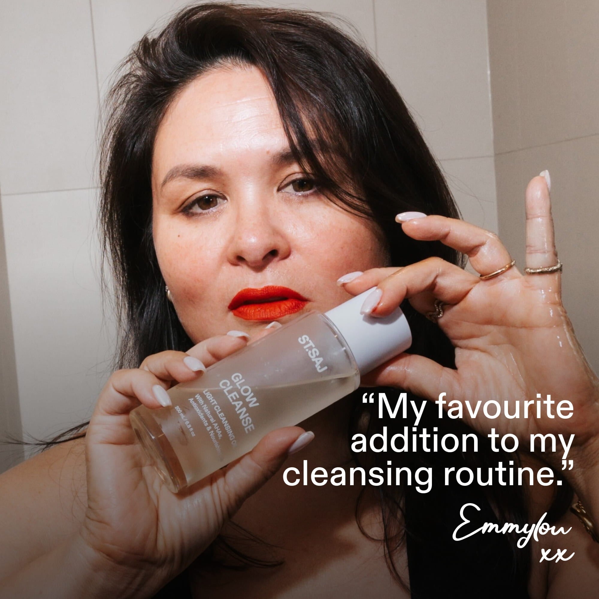 ST.SAJ Glow Cleanse - founder Emmylou with cleansing oil, that lip isn't going to remove itself