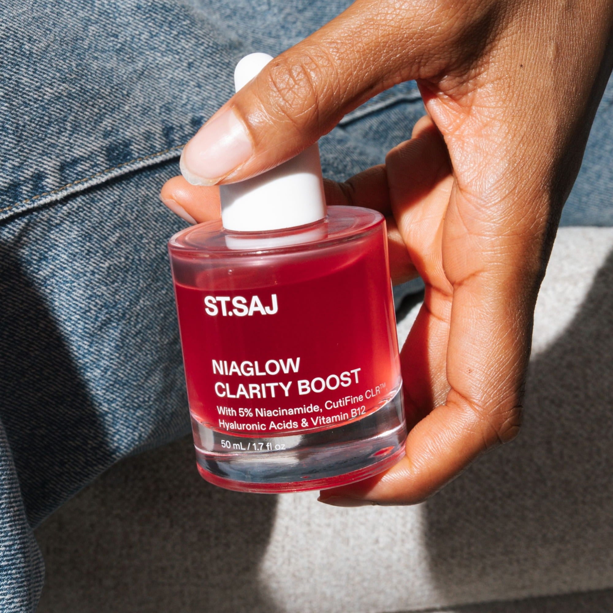 Holding ST.SAJ Niaglow Clarity Boost niacinamide serum - oil control skincare Australia