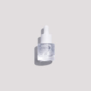 A clear glass dropper bottle of Susann Skin Hyaluhydrating Serum with a white dropper cap, set against a solid light gray background with a soft shadow.