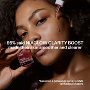 Model using ST.SAJ NiaGlow Clarity Boost mini for smoother clearer skin